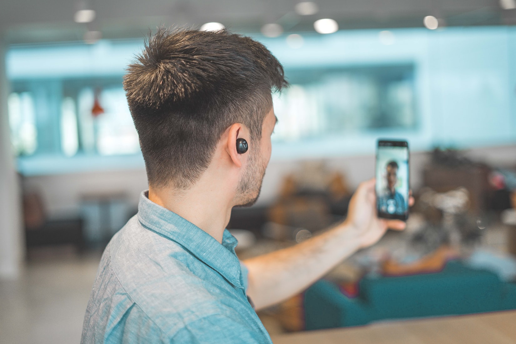 man recording a video for instagram reels