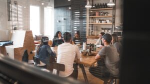 a group social media team members in a collaborative meeting