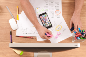 a bunch of papers laid out for UI analysis