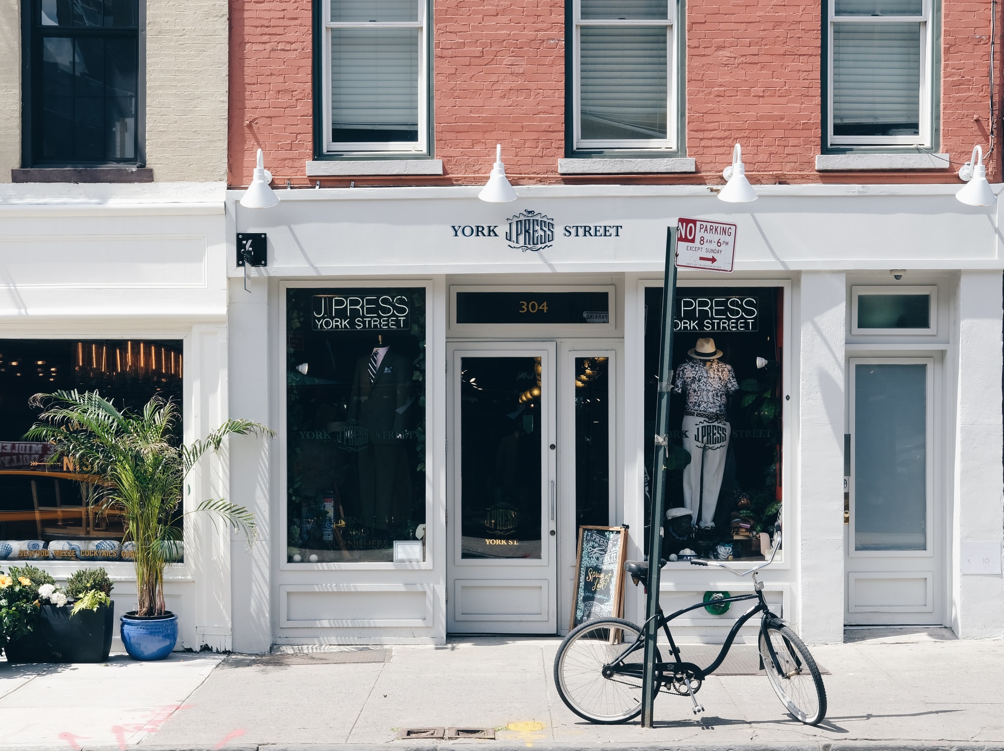 a storefront located in an empty sidewalk
