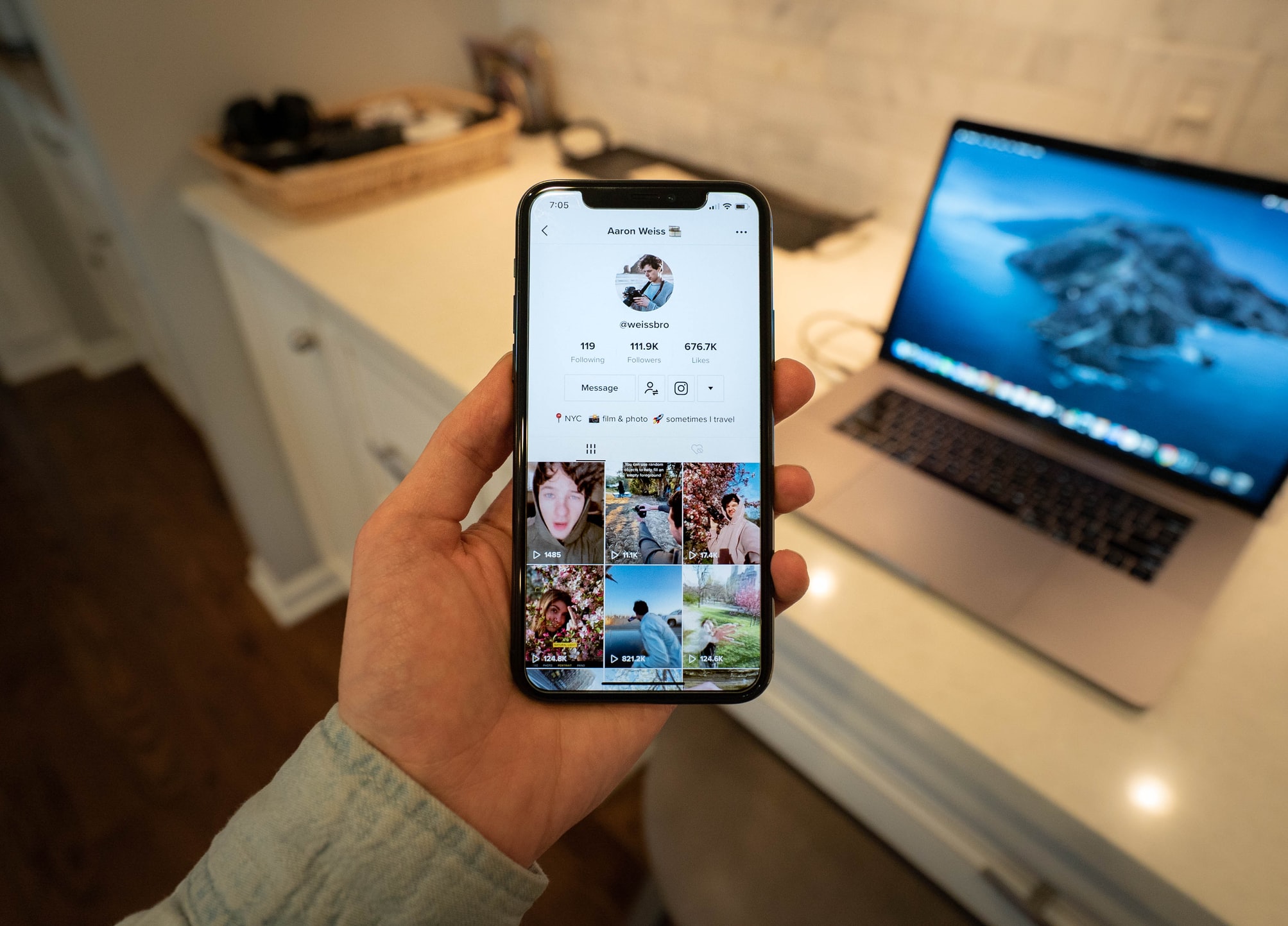 a TikTok profile on an iPhone 11