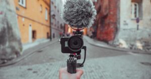 a vlogger setting up their gear for content creation